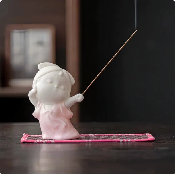 Ceramic little female court attendant incense burner decoration in cute style.
