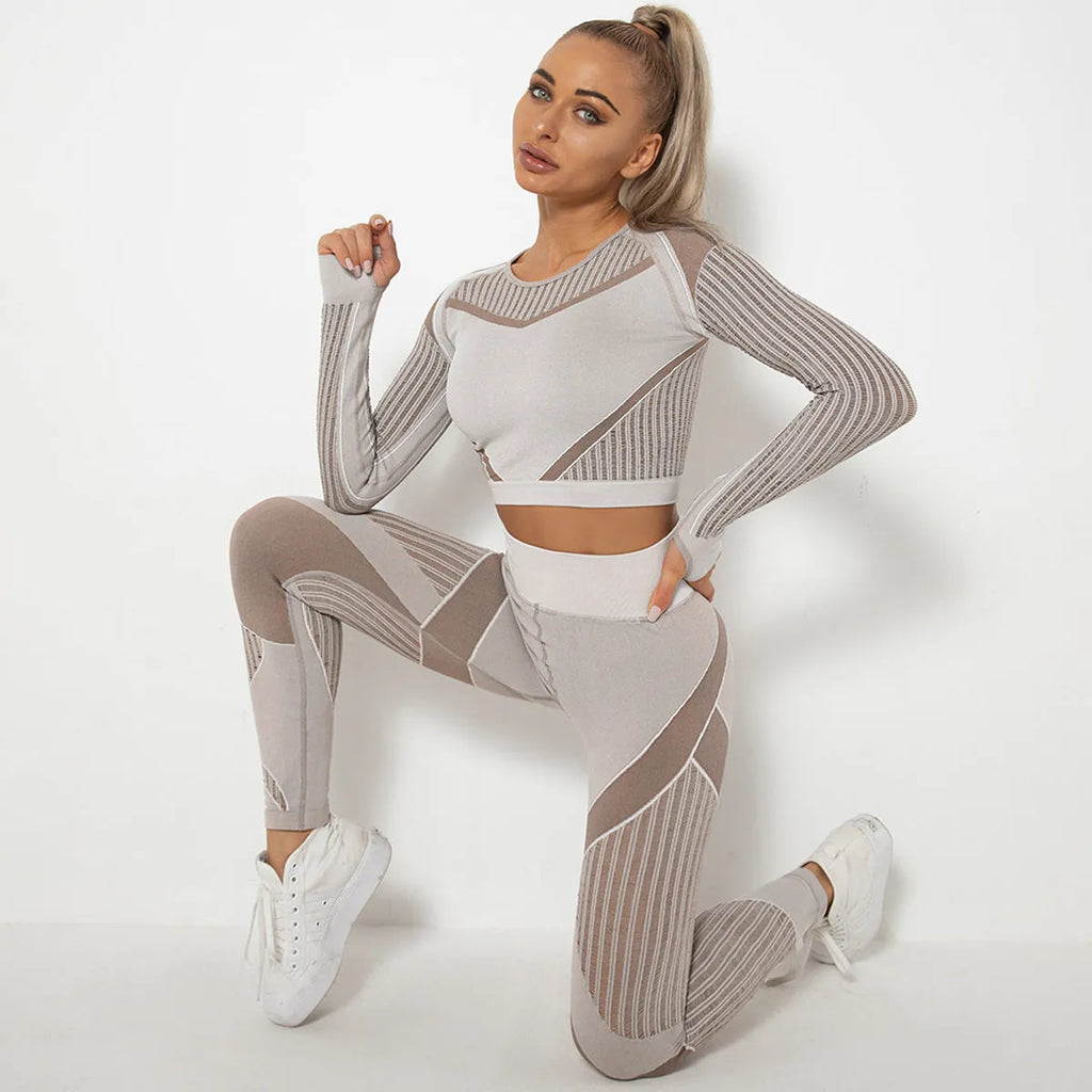 Women's long-sleeved seamless knitted yoga suit in a stripe pattern, shown in navy blue.