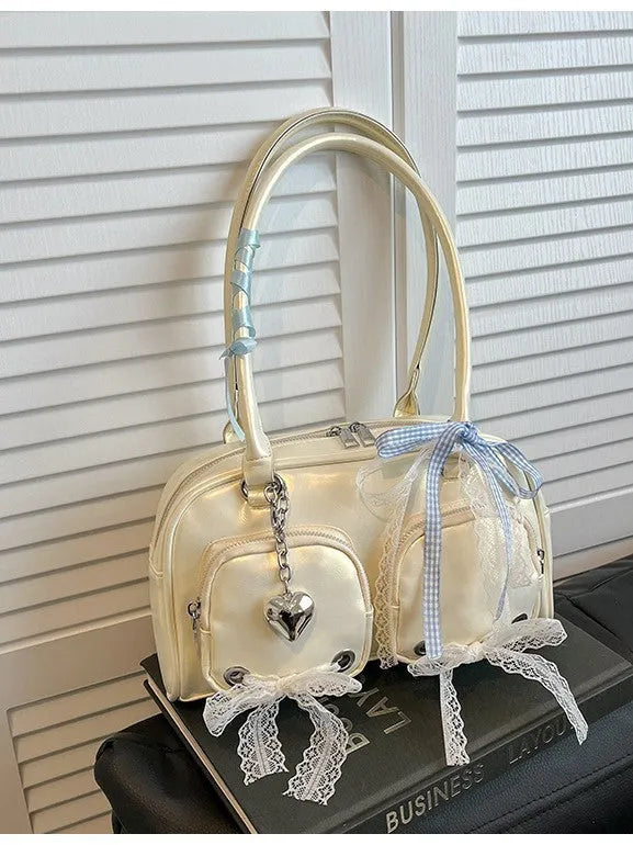 Beige PU cross-body shoulder bag with double straps and square shape showing internal phone compartment