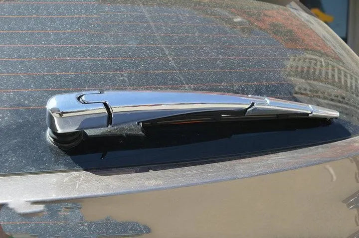 Set of four silvery ABS plastic rear window wiper cover trims for a 2010 Hyundai car.