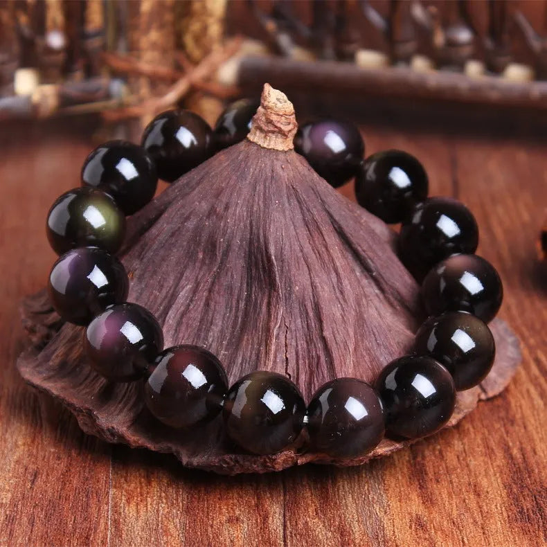 Polished crystal Pi Xiu bracelet with Ice Stone design on a wrist, showing geometric ethnic style.