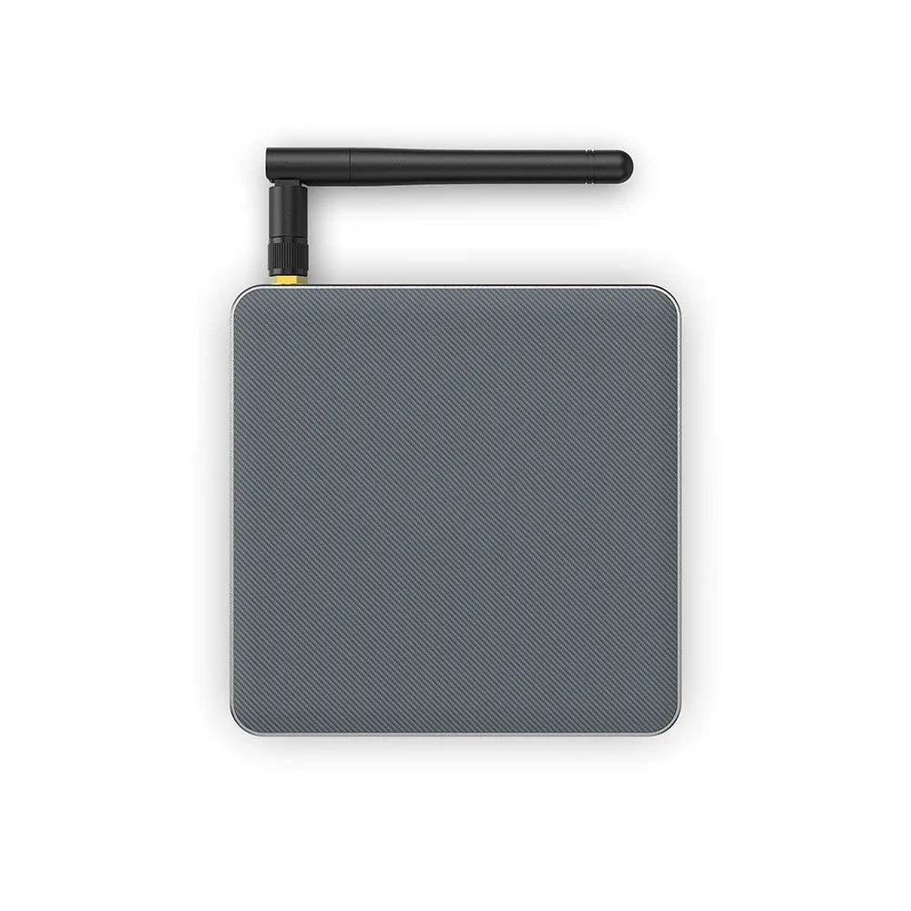 Black Android TV Box with remote, HDMI cable, and power adapter for 8K streaming.