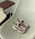 Girls lightweight casual shoes with PU leather mesh upper in black, beige, or pink colours.