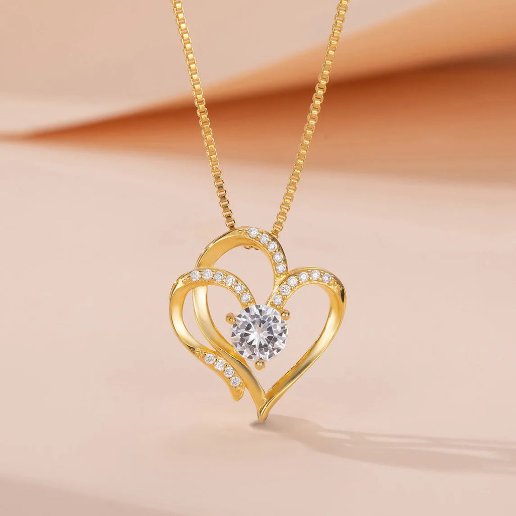 Women's heart-shaped necklace in 925 silver with gold plating and diamond treatment
