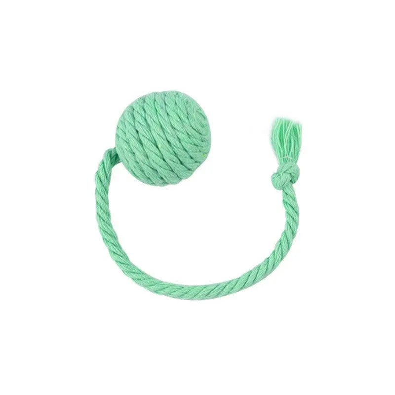 Green cat toy ball with a rope handle looped through it, shown next to a smaller pink version.