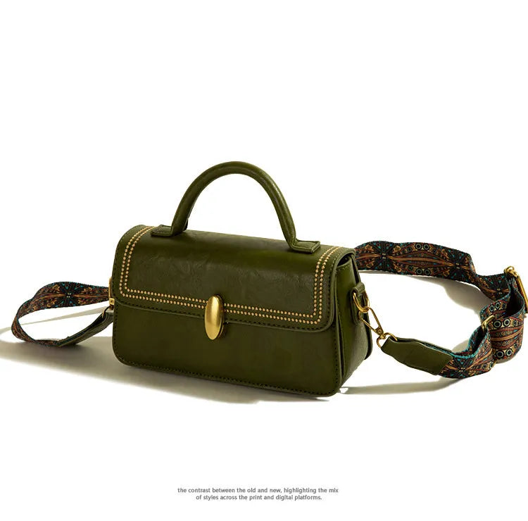 Brown retro messenger bag with square vertical shape showing front sandwich pocket and shoulder strap.