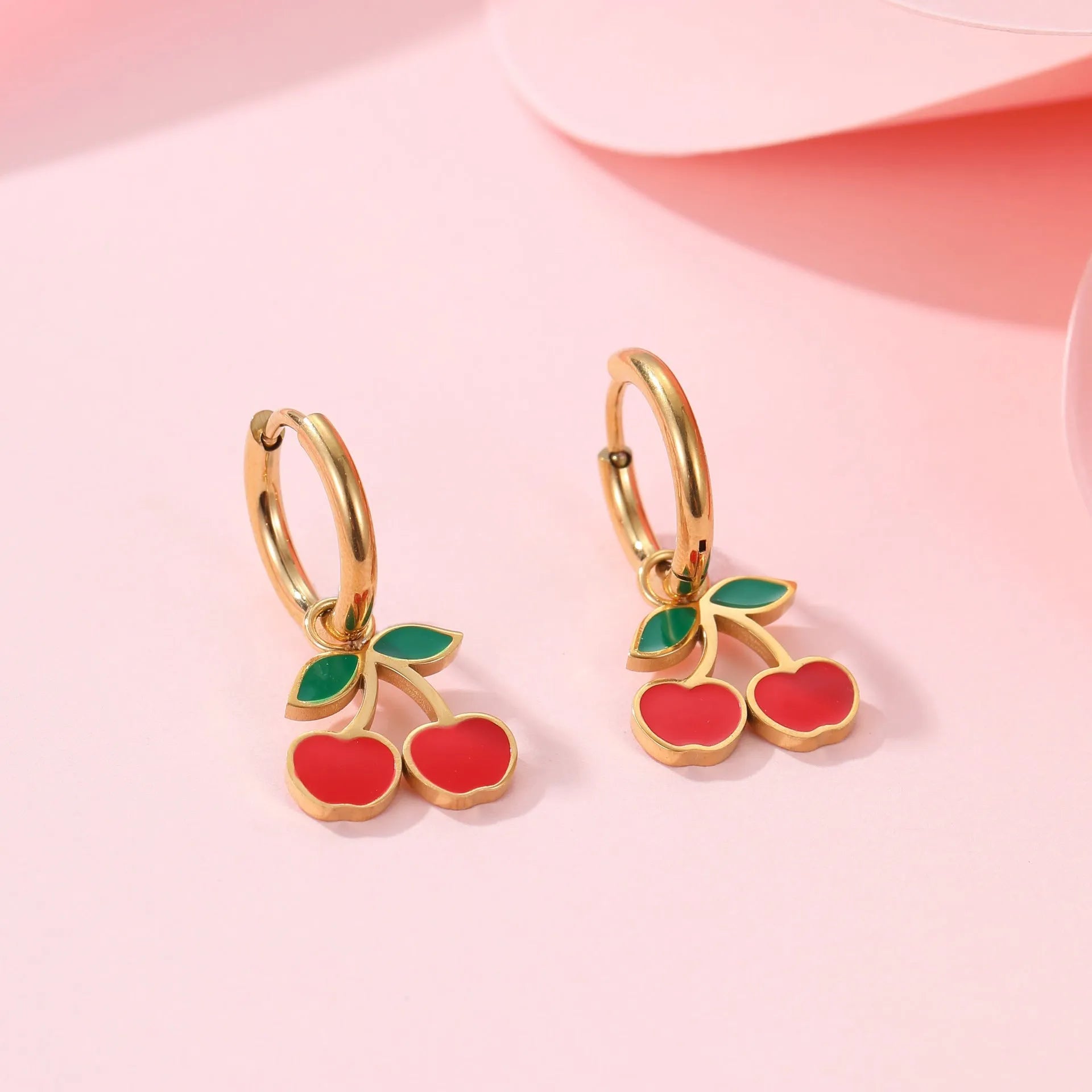 Four-piece cherry jewellery set with necklace, bracelet, earrings and ring in stainless steel with gold-toned finish