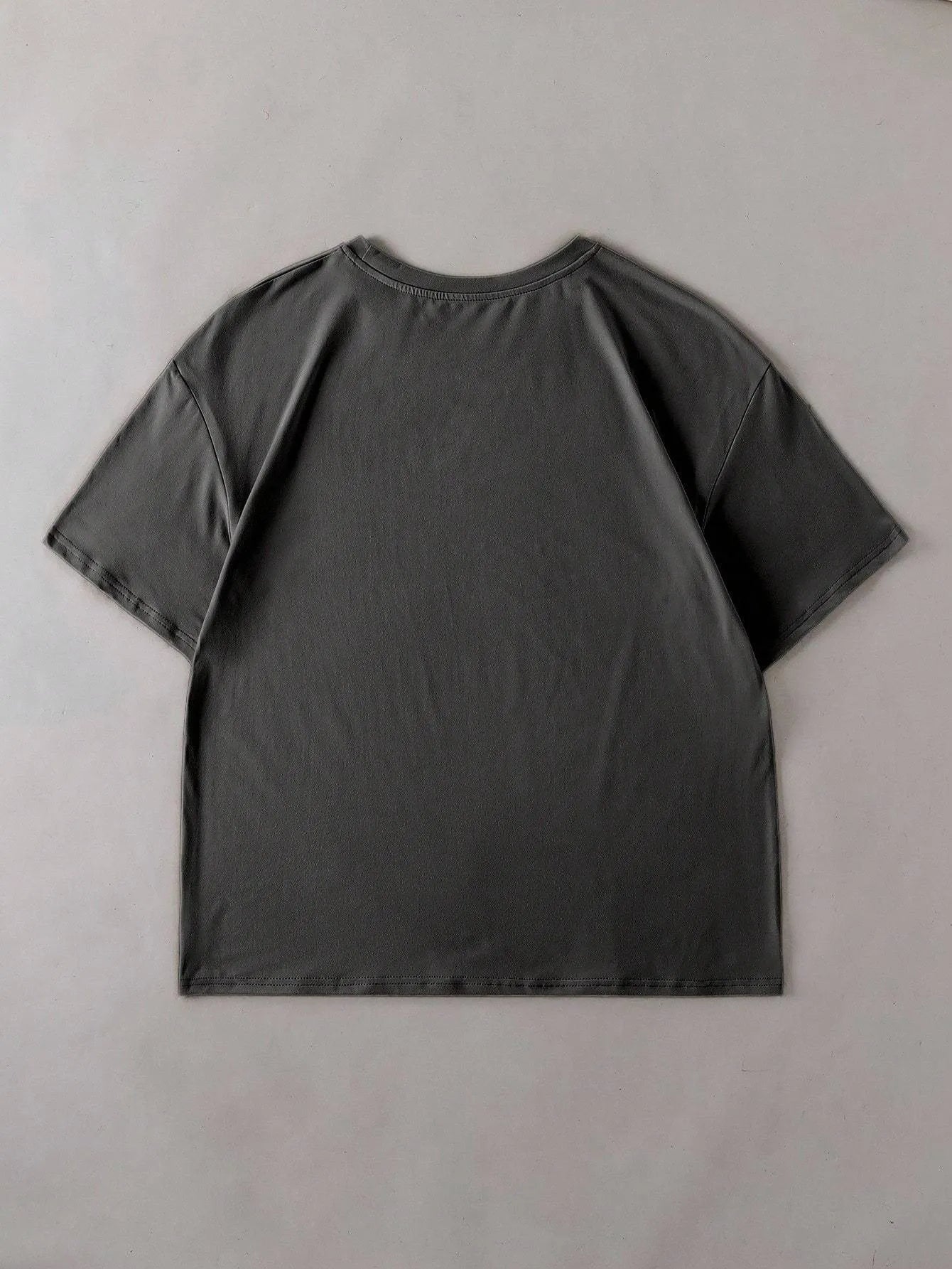 A loose-fitting cotton t-shirt with short sleeves and a round neck, shown in assorted colours.