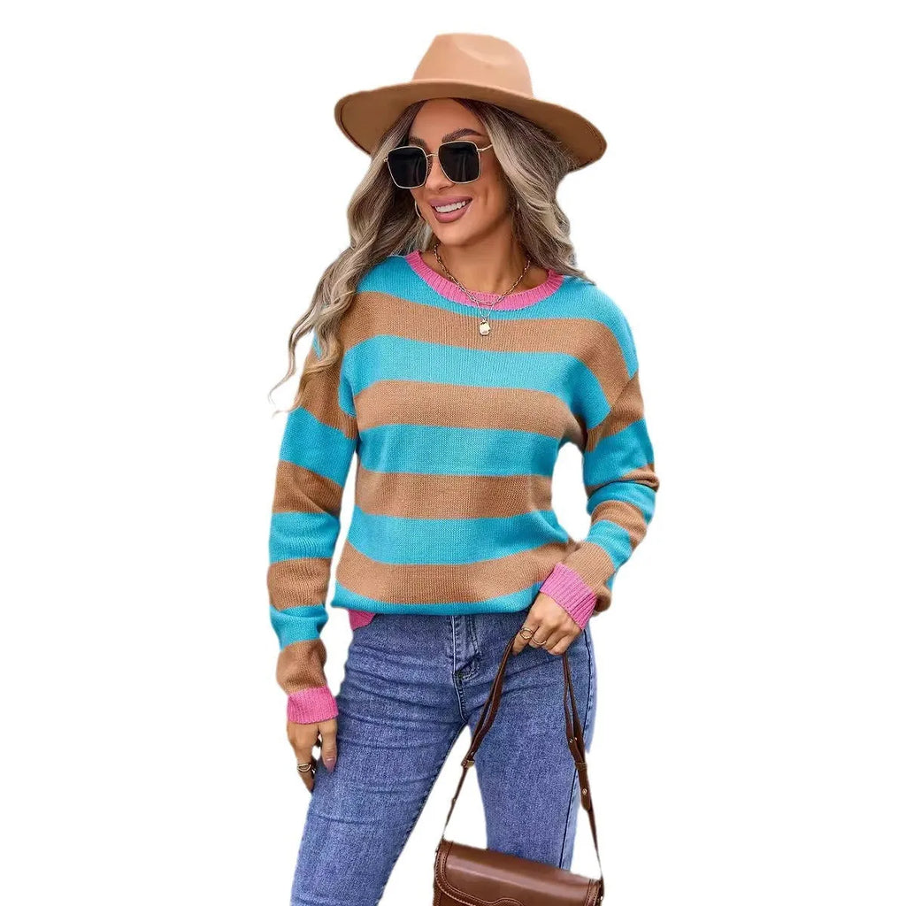 Women's long sleeve loose fit sweater in blue with round neck and knit pattern