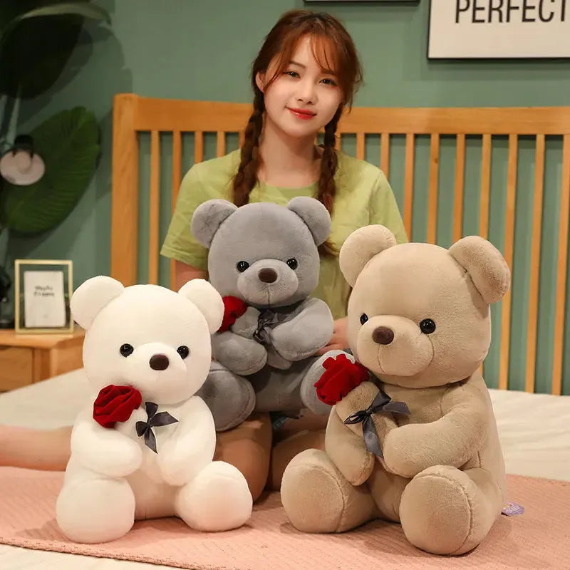 Rose bear plush teddy bear stuffed animal toy in beige, brown or grey colours showing cartoon design