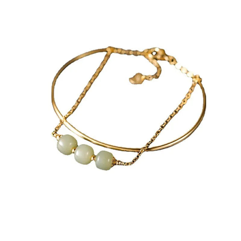 Jade lucky beads bracelet for women with gold inlay, shown in single, double, and three bead versions.