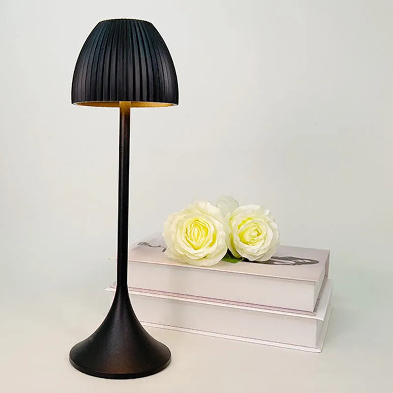 Small modern night lamp with dimming function in black thin round base design on table