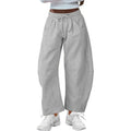 Women's loose cropped sweatpants with drawstring waist and side pockets in apricot colour