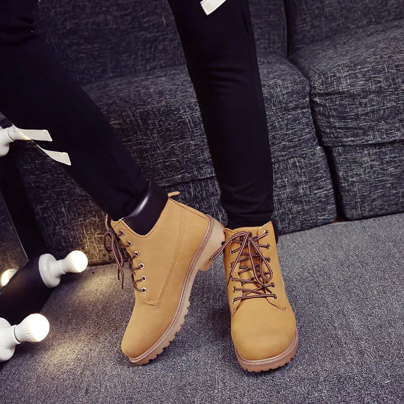 Men's pink high-top lace-up Martin boots with velvet lining and a flat rubber sole.