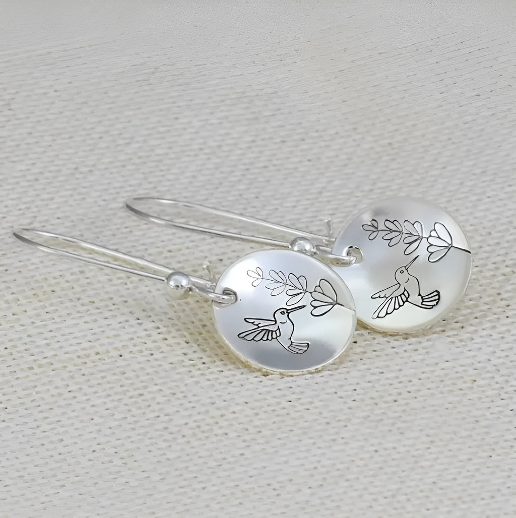 Silver retro women's earrings with bird and leaf designs in polished zinc alloy