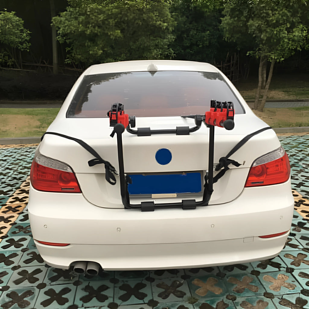 Black and red car boot mounted bike rack with iron frame and dual securing options