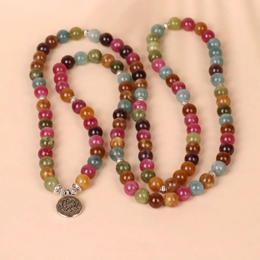 108-bead alloy bracelet with a multi-layer lotus charm in a natural tourmaline colour.