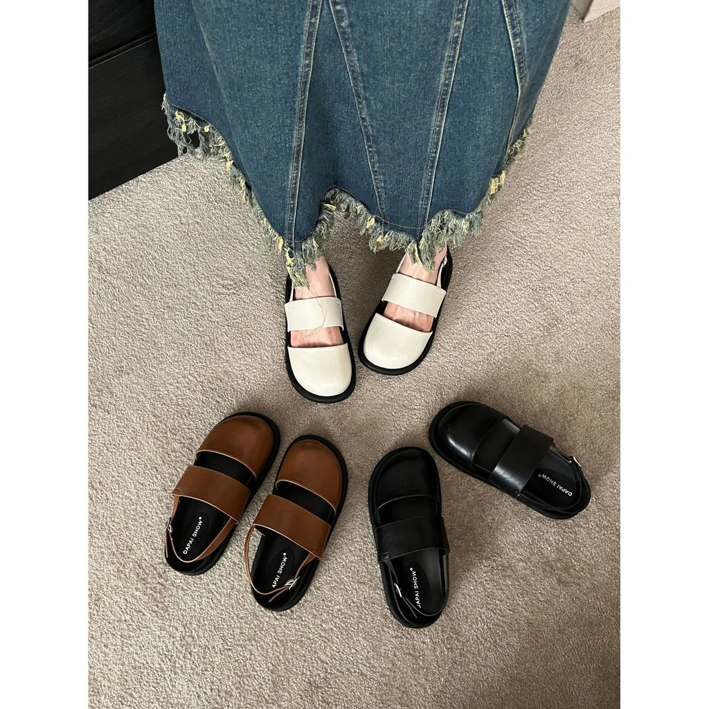 Retro women's closed toe sandals with an adjustable ankle buckle strap in apricot colour.