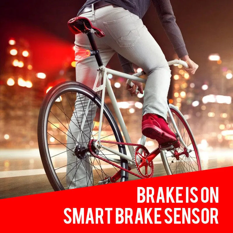 Black USB rechargeable smart brake sensing bicycle taillight with aluminium housing showing multiple LED modes