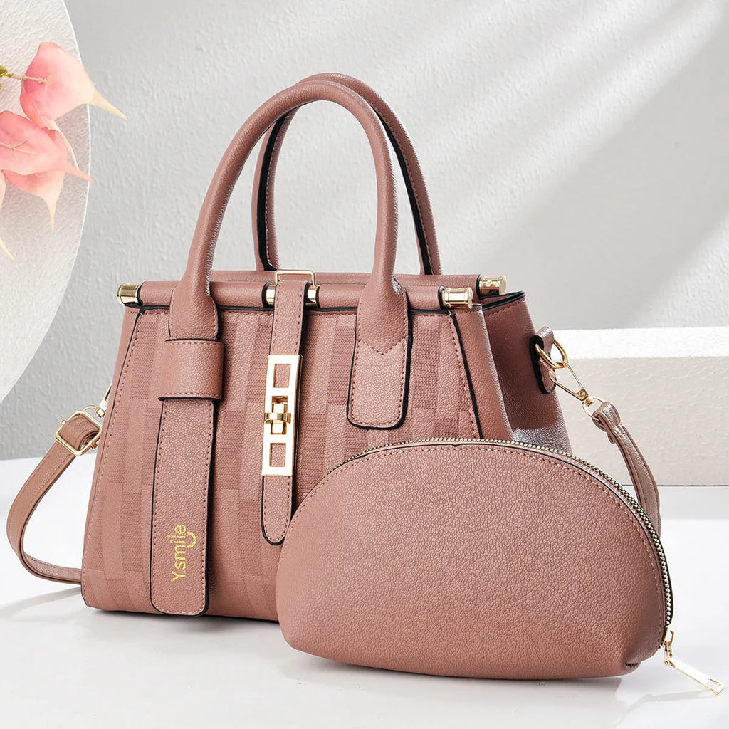 Round structured PU leather crossbody handbag in light khaki colour, showing main compartment and shoulder strap.