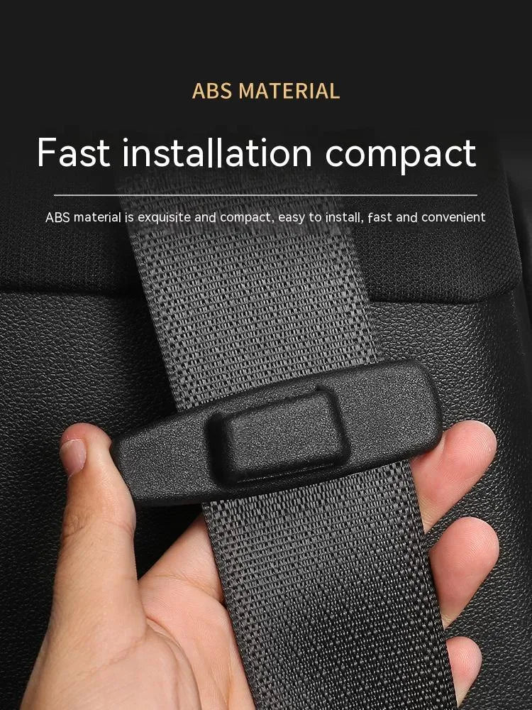 Black ABS plastic car seat belt stopper clips showing universal design for automotive use