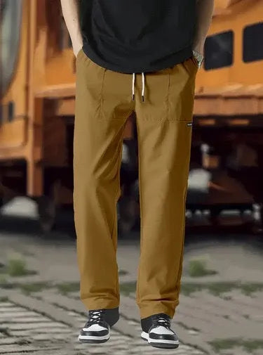 Men's polyester trousers for spring and autumn in light grey, shown in size M.