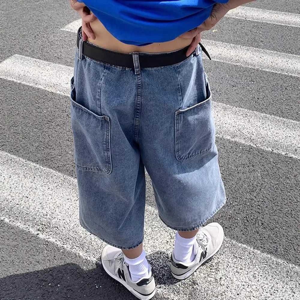 Men's blue washed denim pirate shorts with cropped length and high waist