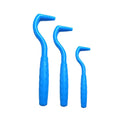 Set of three coloured plastic tick removal hooks for dogs on a white background