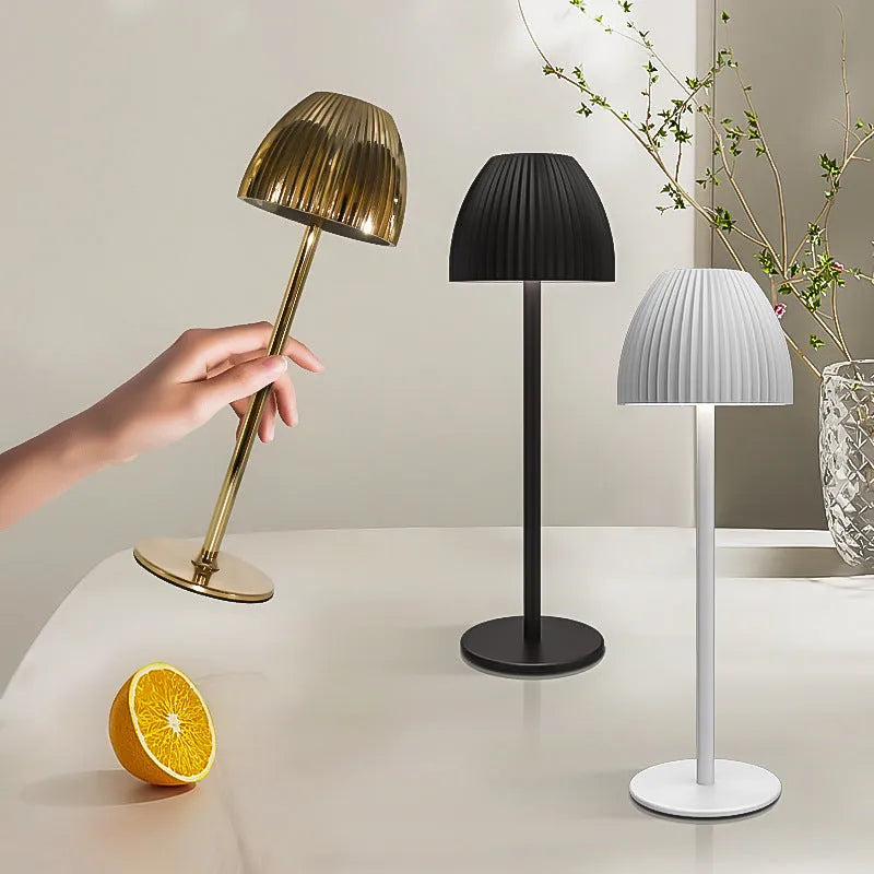 Small modern night lamp with dimming function in black thin round base design on table