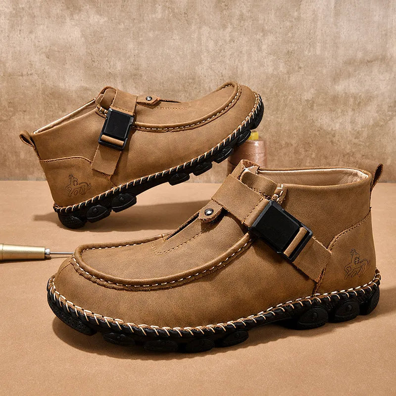 Men's black casual flat slip-on shoes with visible handmade stitching on the PU leather upper.