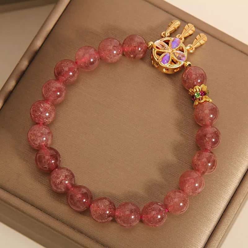 Natural strawberry quartz bracelet with four leaf clover dream catcher pendant on adjustable cord