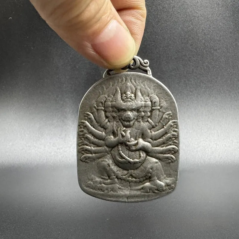Iron metal hanging pendant with Chinese geometric design featuring Buddhist deity motif