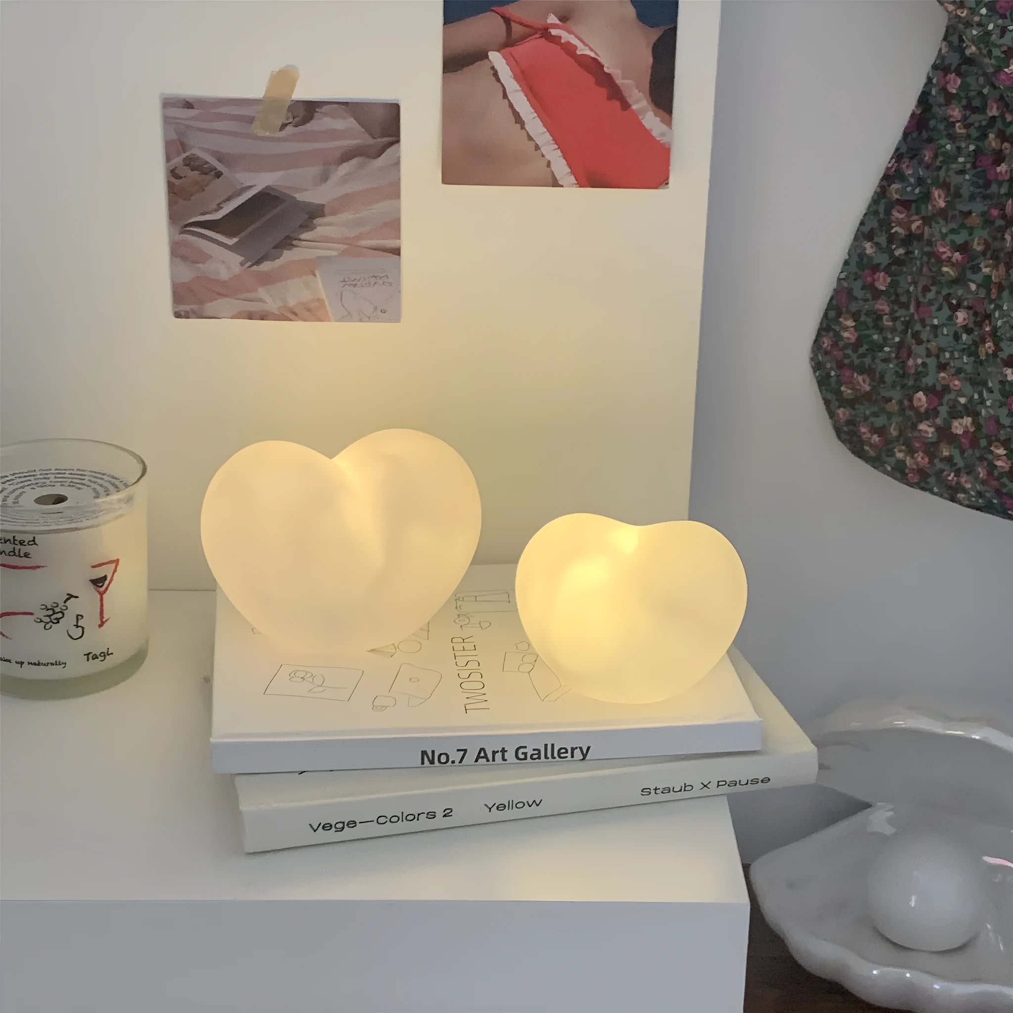 Vinyl atmosphere lamp emitting warm glow light, available in pink or white colours with battery operation