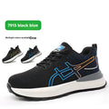 Men's black safety work shoe with mesh upper, rubber sole, and steel toe cap on a industrial floor.