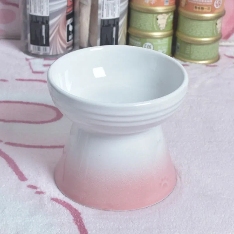 High-foot ceramic pet bowl with chin protector and anti-tumble base design