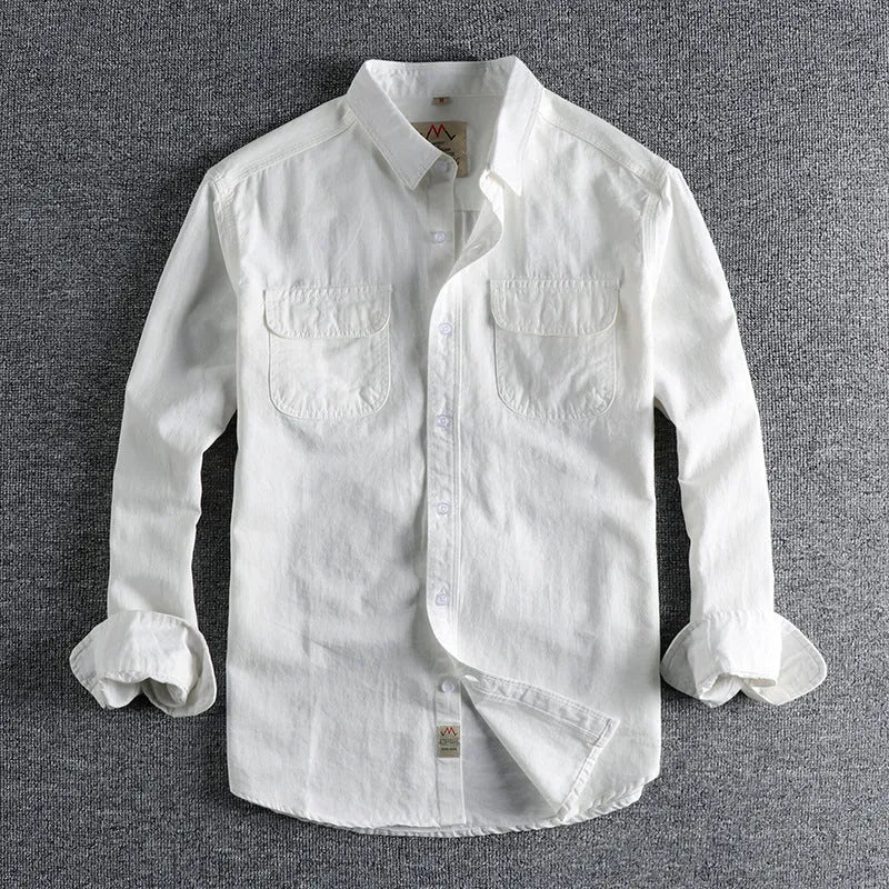 Men's light blue cotton long sleeve cardigan-style shirt on a hanger.