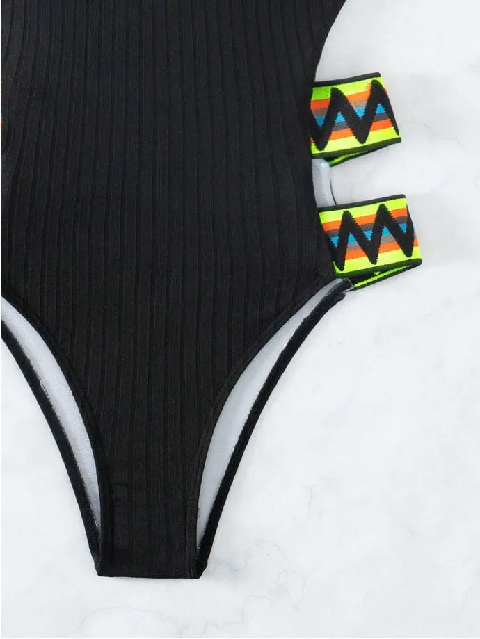 Women's solid colour one-piece swimsuit in black or orange options with Asian sizing