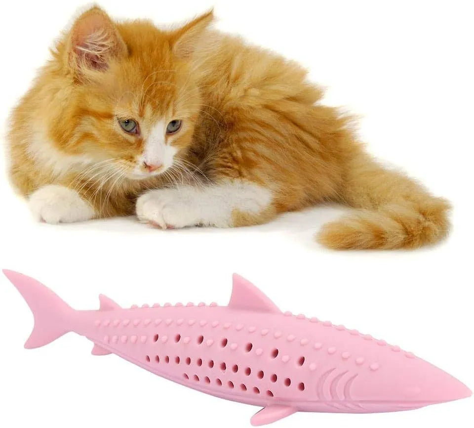 Green silicone fish-shaped cat chew toy with removable parts for catnip, shown on a white background.