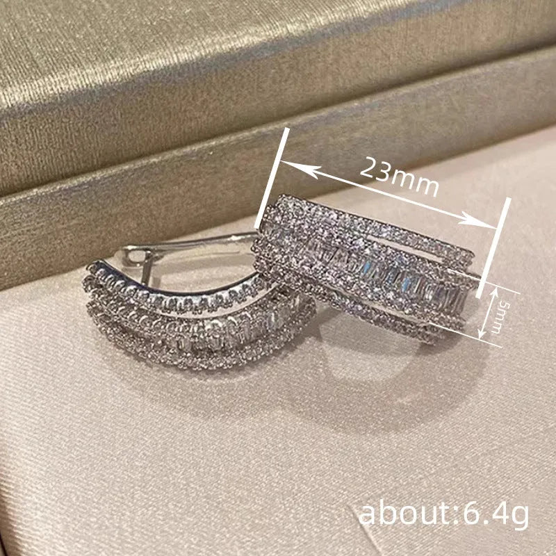 Women's geometric copper stud earrings with inlaid white zircon stones and white gold colour finish