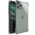 Clear transparent TPU shockproof phone case for Apple iPhone models on a table.