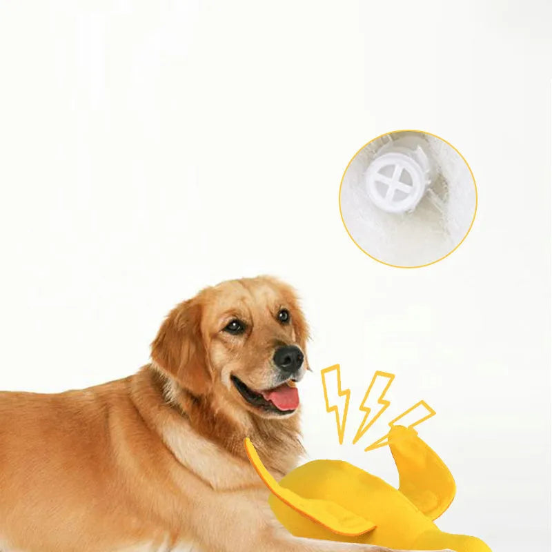 Yellow dog training toy with duck sound module and central treat dispenser slot