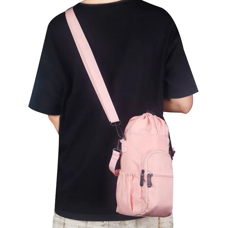 Cloth water bottle pouch crossbody bag in black, green, or pink colours with an adjustable strap.