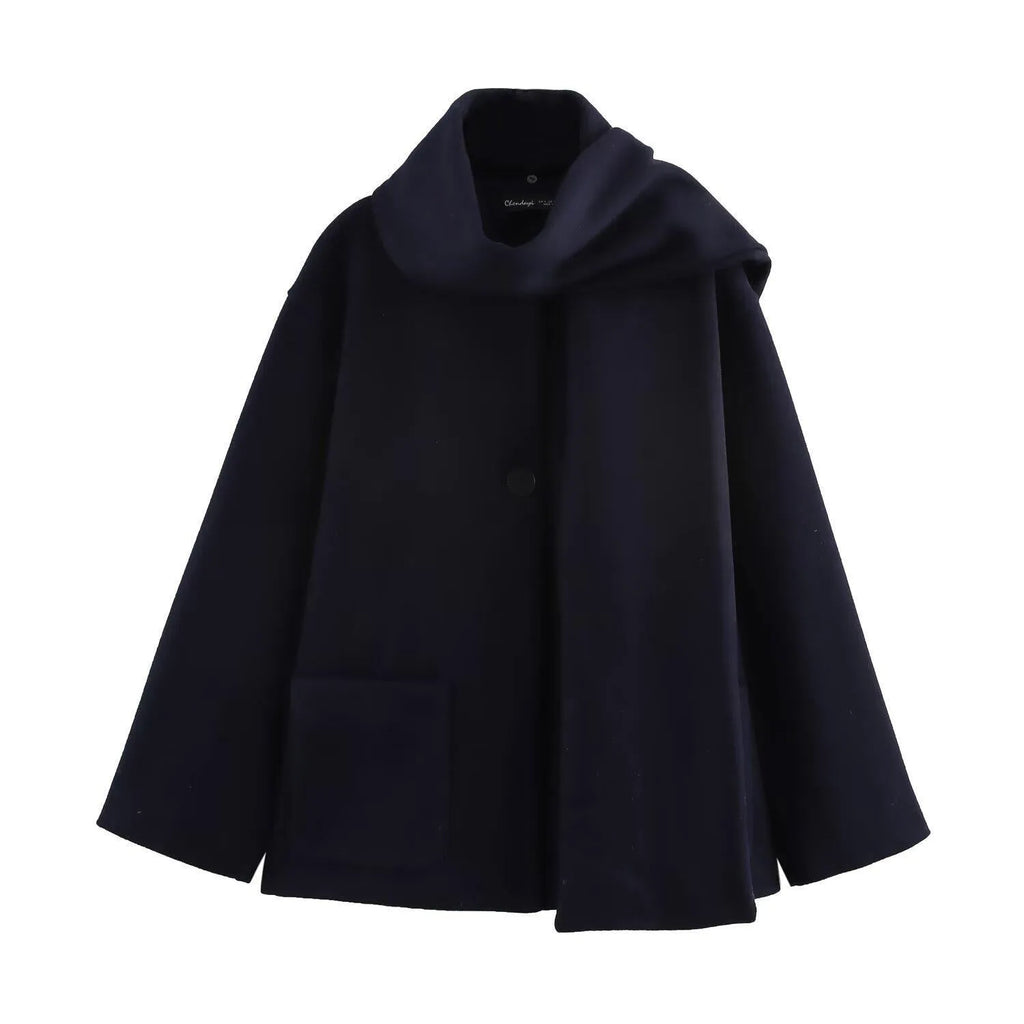 Women's longline street fashion coat with artificial fur collar in lengthened silhouette