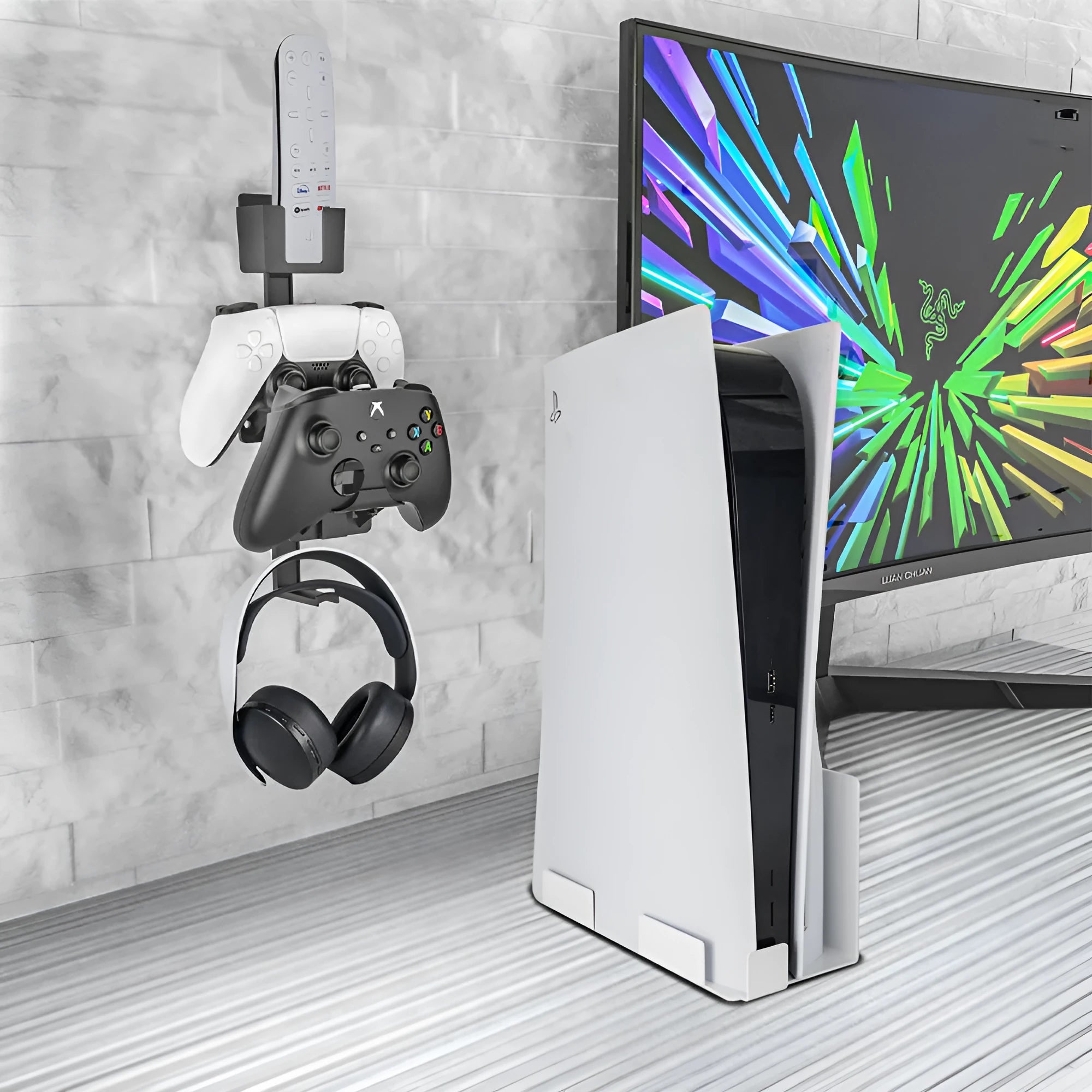 White ABS plastic wall hook holding PlayStation and Xbox game controllers