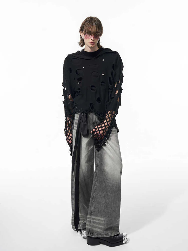Men's black loose-fit hooded sweater with pearl decoration showing pullover design and regular sleeves