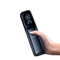 Black portable electric car air pump with built-in pressure gauge and power plug for 12V/24V vehicles.