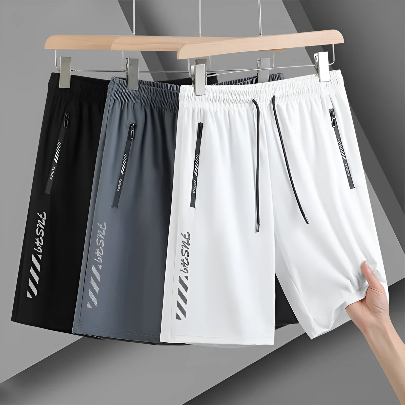 Man wearing black loose-fit quick-dry nylon sports shorts for summer activities