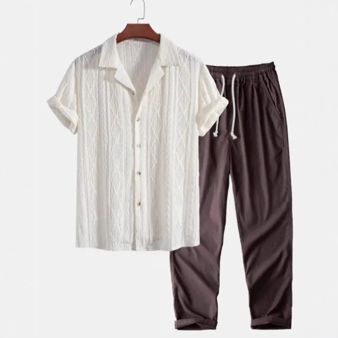 Camouflage printed short-sleeve shirt and trousers casual suit set on a hanger.