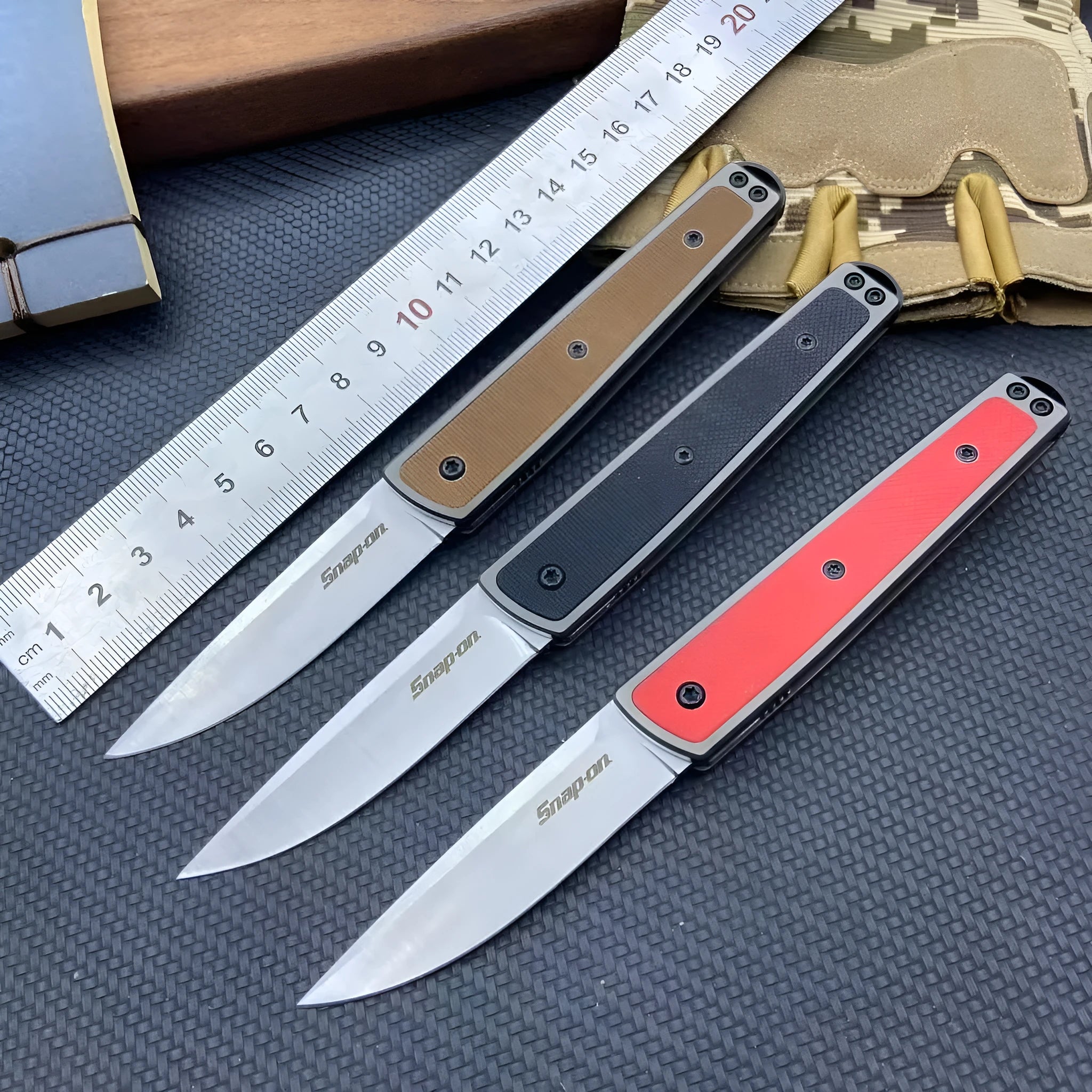 Folding fruit knife with stainless steel blade in black, coffee, or red colour measuring 17cm total length