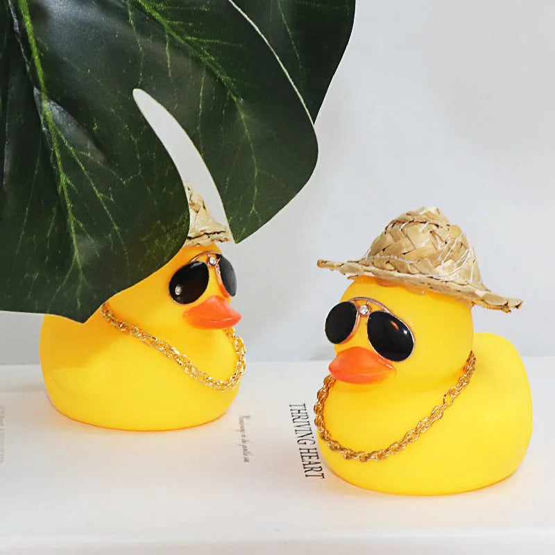 Straw hat yellow duck cartoon car ornament with matte finish and sunglasses accessory